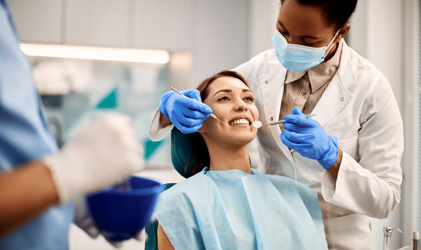 Woman sitting in dental chair at dentist near Everett WA